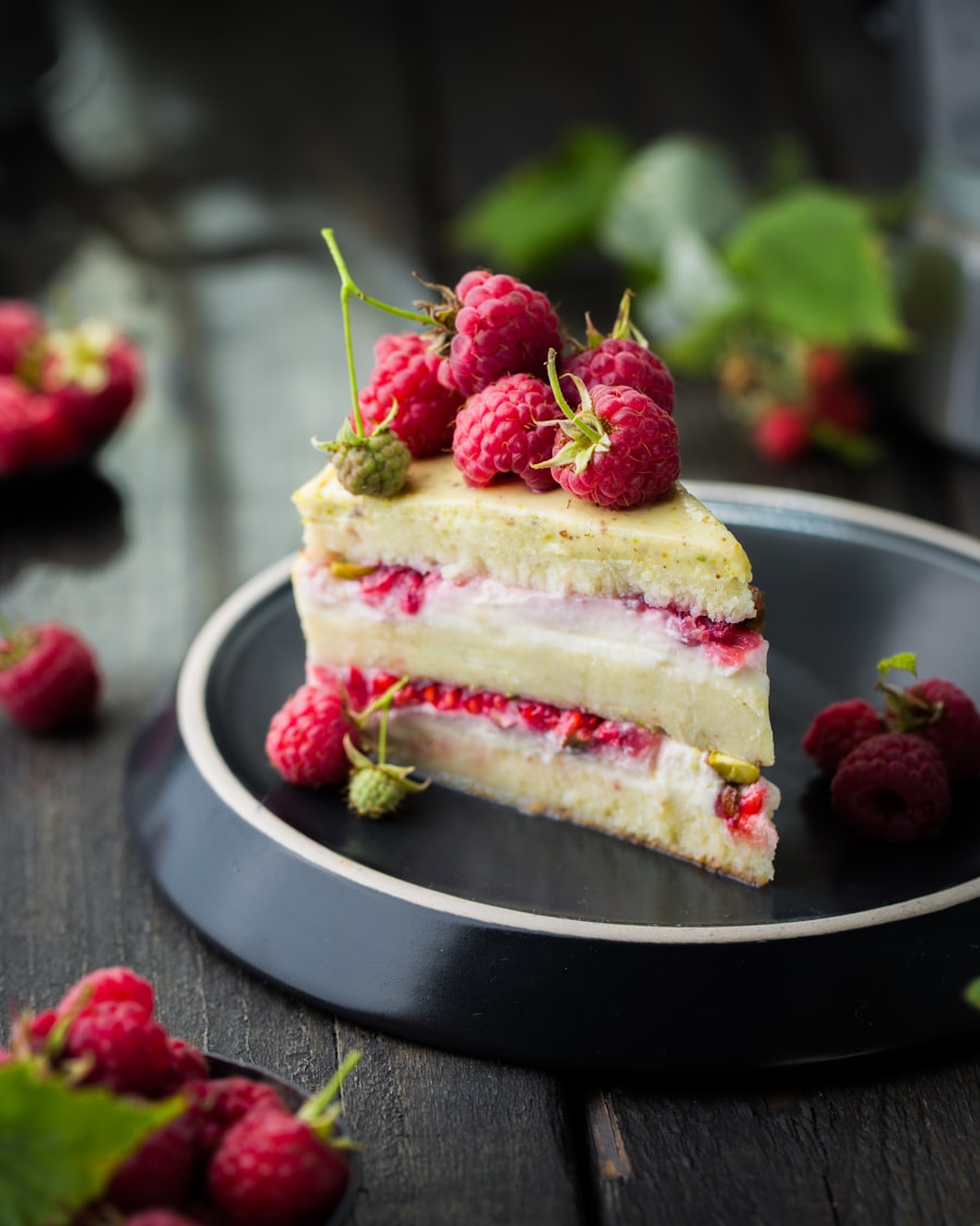 Pistachio raspberry layered cheesecake slice at The Bakest, Okhla